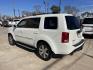 2014 White /Silver Honda Pilot Touring 2WD 5-Spd AT with DVD (5FNYF3H90EB) with an 3.5L V6 SOHC 24V engine, 5-Speed Automatic transmission, located at 1501 West 15th St., Houston, 77008, (713) 869-2925, 29.797941, -95.411789 - Photo#3