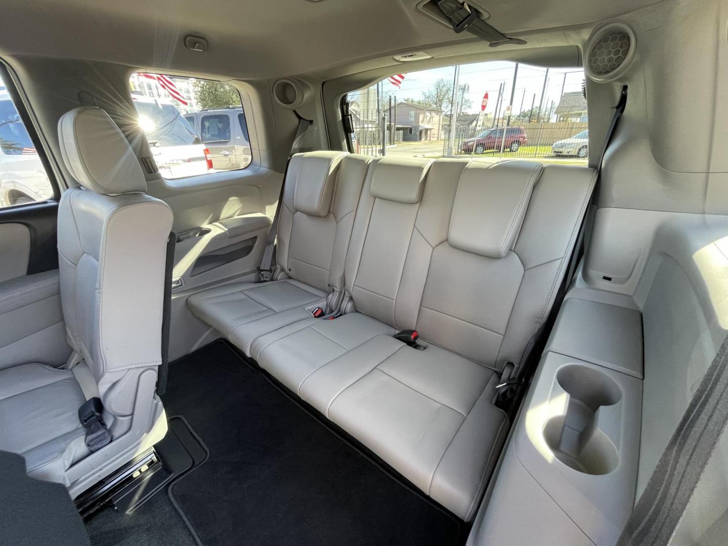 2014 White /Silver Honda Pilot Touring 2WD 5-Spd AT with DVD (5FNYF3H90EB) with an 3.5L V6 SOHC 24V engine, 5-Speed Automatic transmission, located at 1501 West 15th St., Houston, 77008, (713) 869-2925, 29.797941, -95.411789 - Photo#6