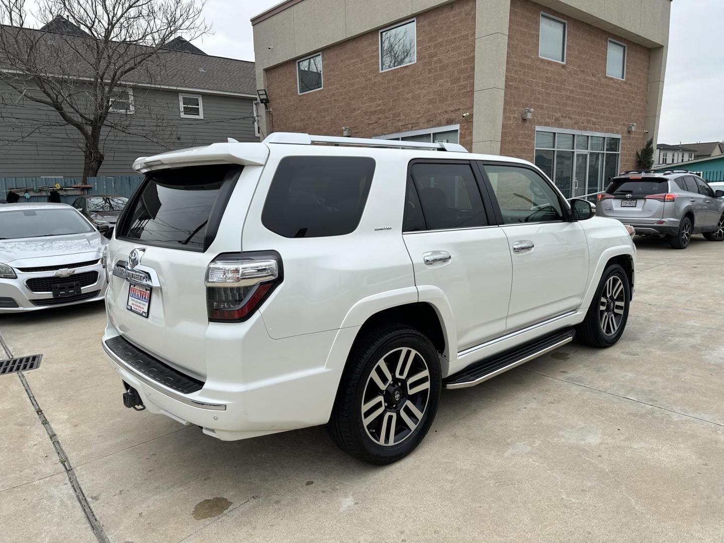 2015 White /Black Toyota 4Runner SR5 2WD (JTEZU5JR0F5) with an 4.0L V6 DOHC 24V engine, 5-Speed Automatic transmission, located at 1501 West 15th St., Houston, 77008, (713) 869-2925, 29.797941, -95.411789 - Photo#2