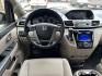 2017 Maroon /Silver Honda Odyssey EX-L w/Navigation (5FNRL5H68HB) with an 3.5L V6 SOHC 24V engine, 6A transmission, located at 1501 West 15th St., Houston, 77008, (713) 869-2925, 29.797941, -95.411789 - Photo#10