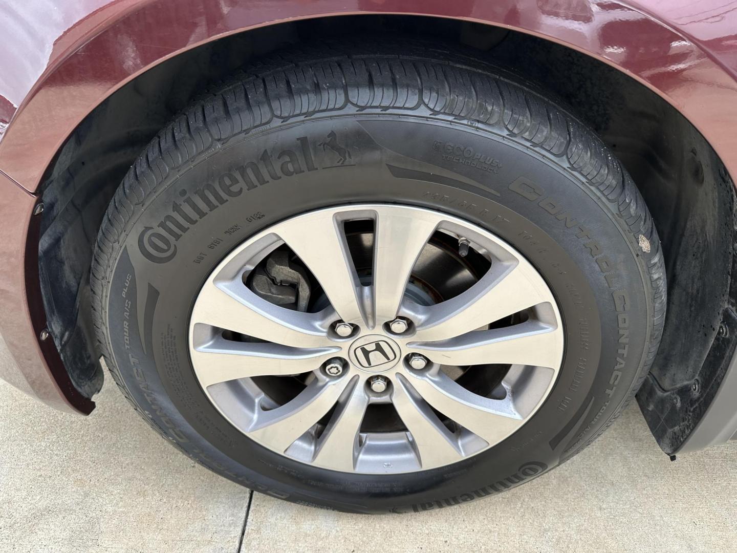 2017 Maroon /Silver Honda Odyssey EX-L w/Navigation (5FNRL5H68HB) with an 3.5L V6 SOHC 24V engine, 6A transmission, located at 1501 West 15th St., Houston, 77008, (713) 869-2925, 29.797941, -95.411789 - Photo#12