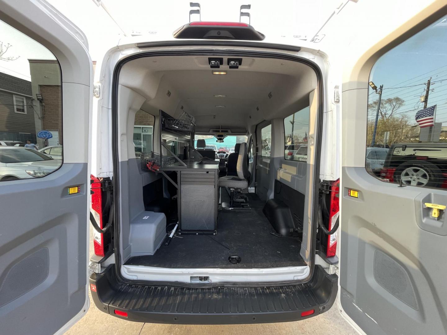 2018 White /Black Ford Transit 150 Wagon Med. Roof XLT w/Sliding Pass. 130-in. WB (1FDZK1CM5JK) with an 3.7L V6 DOHC 24V engine, 6A transmission, located at 1501 West 15th St., Houston, 77008, (713) 869-2925, 29.797941, -95.411789 - Photo#4